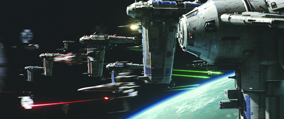 Multiple futuristic spacecraft flying through dark space above a glowing blue planet with green laser beams.