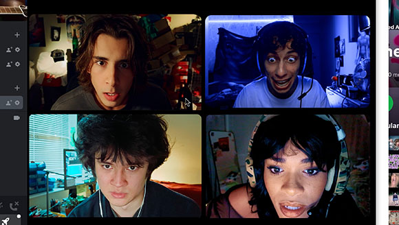 Four individuals appearing in separate video call windows on a computer screen.