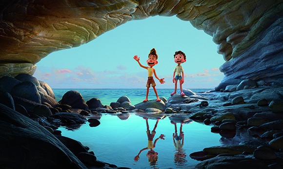 Two animated boys stand on rocks inside a sea cave, looking out at a calm blue ocean.