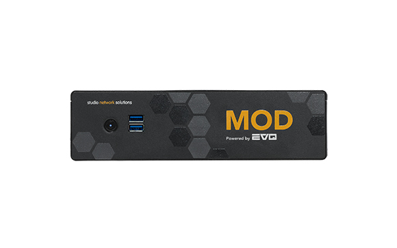 Black Studio Network Solutions MOD device with USB ports and a hexagonal pattern.