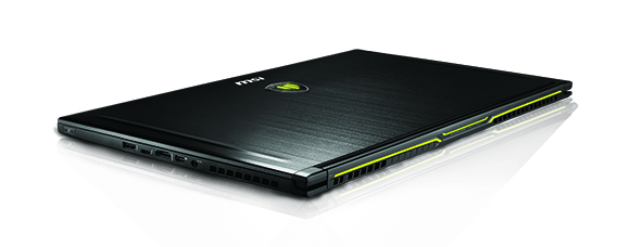 A black MSI gaming laptop shown from a low angle on a white reflective surface.