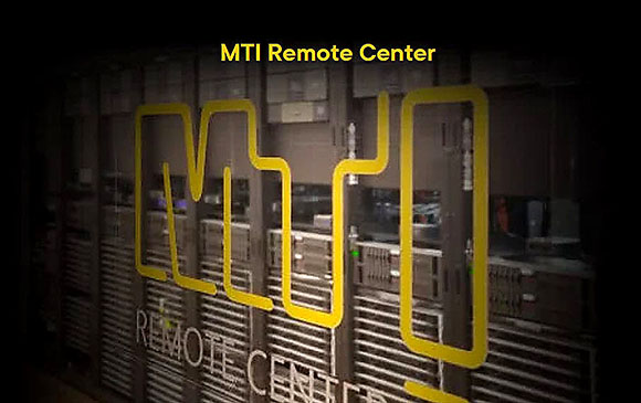 A yellow MTI logo overlaid on dark server racks in a data center.