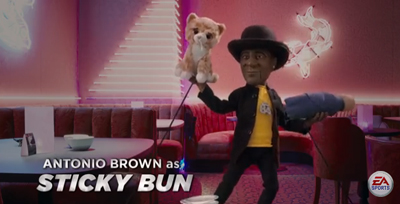 Caricature of a man in a black hat and jacket holding a stuffed cat and a doll in a pink lounge.