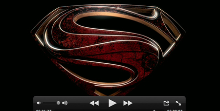 A textured, dark red and gold metallic Superman shield emblem against a black background.