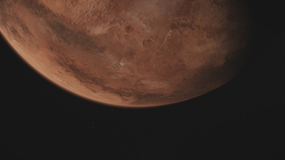 A close-up view of a reddish-brown, cratered planet against a black background.