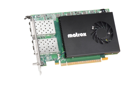 A Matrox brand computer graphics card with a black cooling fan shroud and a silver heatsink.