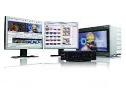 Two computer monitors displaying video editing software next to a large hardware processing unit.