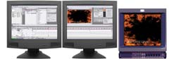 Three computer monitors side-by-side showing software interfaces and a dark, textured orange and black image.