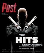 A man in a suit with crossed guns, with the words "The Hits Keep Coming" on the cover.