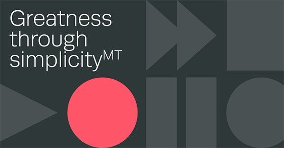 Text reading 'Greatness through simplicity MT' next to gray triangles, rectangles, and a pink circle.