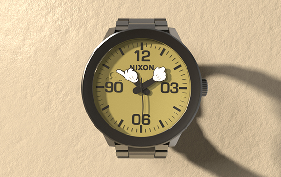 A Nixon wristwatch with a tan face and cartoon white gloved hands on a textured tan surface.