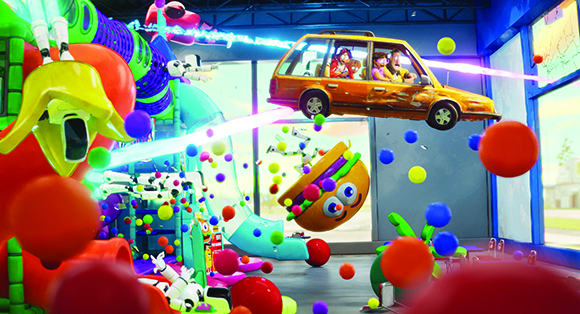 Surreal collage of a floating orange car, a large burger, and many colorful spheres in a bright room.