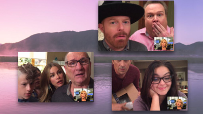 Multiple video call windows showing various people's faces over a purple sunset mountain landscape.
