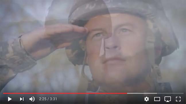 Double exposure of a soldier saluting and a close-up portrait of a soldier wearing a helmet.