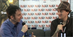 Two men sit on a couch holding microphones in front of a Post TV branded backdrop.