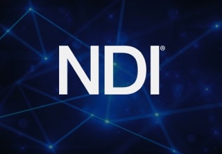 White NDI text centered over a dark blue background with glowing interconnected lines and nodes.