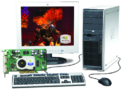 Desktop computer with monitor, tower, keyboard, mouse, and a separate graphics card.