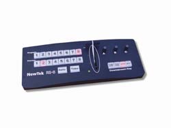 A black NewTek RS-8 control panel with numeric buttons and a central slider.