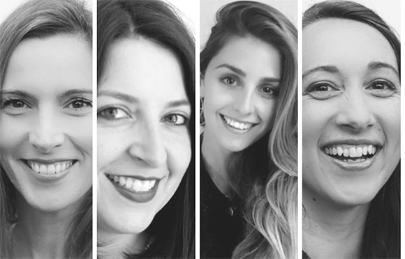 Four black and white close-up portraits of different women smiling.