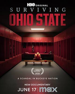 A lone person sits on a bench in a dark, red locker room under a single light.