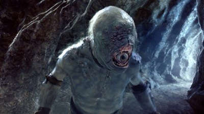 A pale, amphibious humanoid creature with large, bulging eyes and a wide-open mouth in a dark cave.