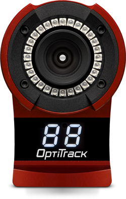 A red OptiTrack motion capture camera with a circular ring of white LEDs around the lens and a digital display.