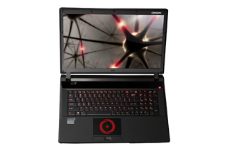 Open black laptop displaying an abstract dark image on the screen and featuring a red backlit keyboard.