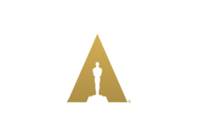Gold triangle containing a silhouette of the Oscar statuette on a white background.
