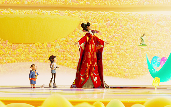A tall figure in a long red gown stands before two children in a bright, yellow candy-filled landscape.
