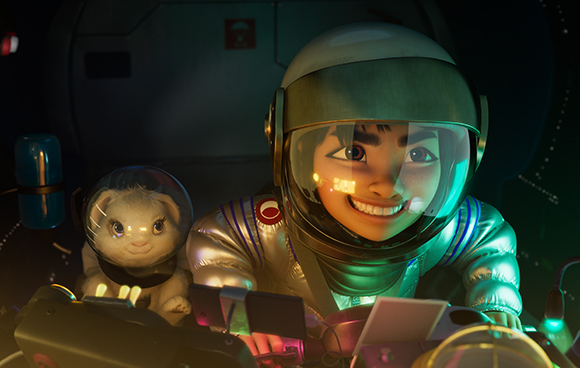 An animated young astronaut smiling in a helmet next to a small white creature in a space cockpit.