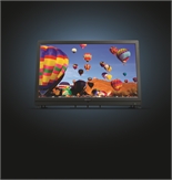A flat-screen television shows a colorful scene of many hot air balloons floating in a blue sky.