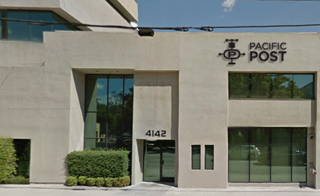 A beige two-story commercial building with the Pacific Post logo and the number 4142.