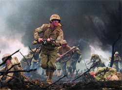 Soldiers in military uniforms charging forward through thick smoke and debris on a battlefield.