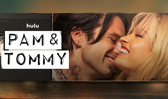 A man and a woman lean close together, smiling with their eyes closed.