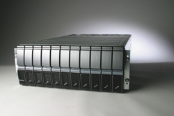 A rectangular, dark grey industrial server chassis with multiple vertical modular components.