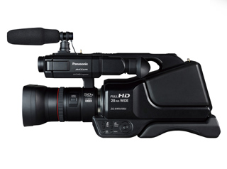 A black Panasonic AVCCAM professional video camera with a shotgun microphone attached to the top.
