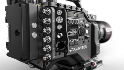 Close-up view of the side panel and various connection ports on a black Panavision cinema camera.