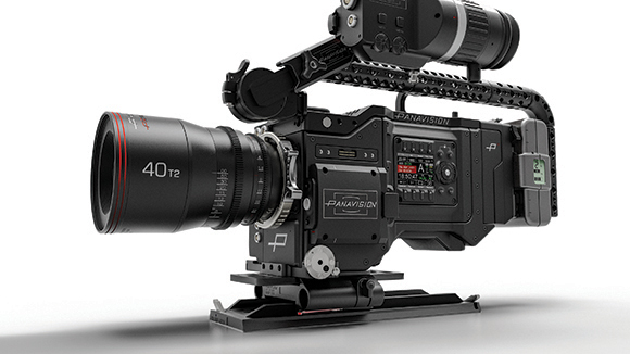 A black Panavision cinema camera with a large 40T2 lens and mounted accessories on a white background.