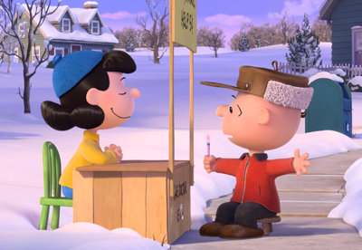 An animated girl in a yellow coat and blue hat sits behind a wooden stand facing an animated boy in a red coat.