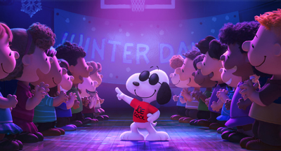 Snoopy wearing sunglasses and a red shirt performs on a stage in front of a crowd of Peanuts characters.