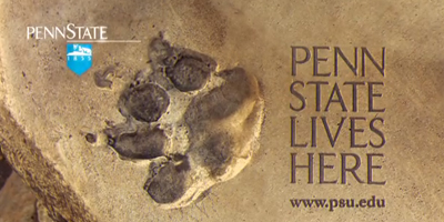 A large, dark animal paw print pressed into a light brown, textured surface next to Penn State text.