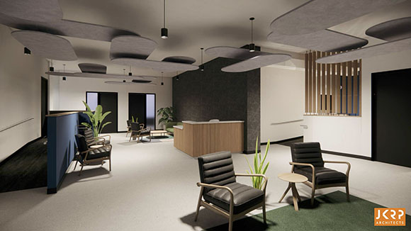 A modern office lobby featuring grey acoustic ceiling panels, a wooden reception desk, and black leather armchairs.