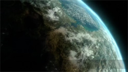 A view of Earth from space showing landmasses, clouds, and a blue atmospheric glow against the black void.