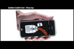 A hand holds a smartphone showing an animation of a drink being poured into a glass.