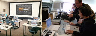 A classroom with a large projector screen and a studio with people using computers and audio equipment.