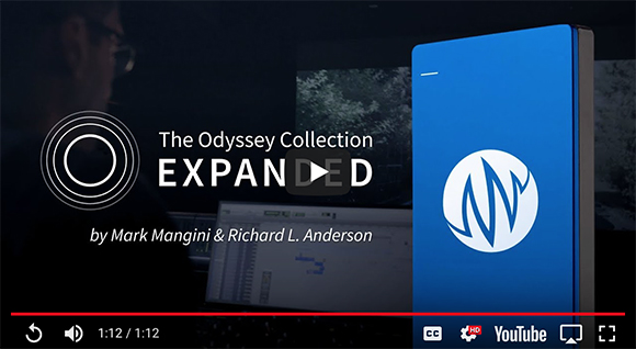Text overlay for The Odyssey Collection Expanded over a dark background with a blue device.