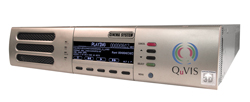 A silver rack-mounted electronic device with a digital screen, buttons, and a colorful circular logo.