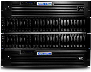 Three Quantum StorNext P600 storage arrays stacked vertically. Each unit has multiple drive bays and a blue Quantum logo.