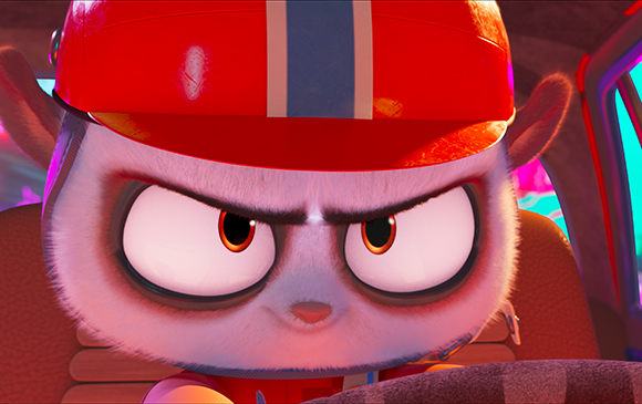 Close-up of an angry, white-furred animated character wearing a red and blue cap.