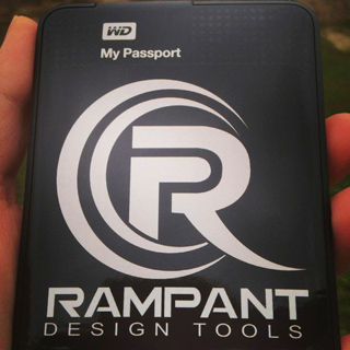 A black WD My Passport external hard drive featuring a large white Rampant Design Tools logo.